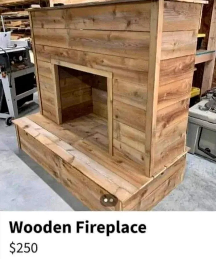 Wooden fireplace display for sale in workshop setting, priced at $250; a hard-to-believe real image.