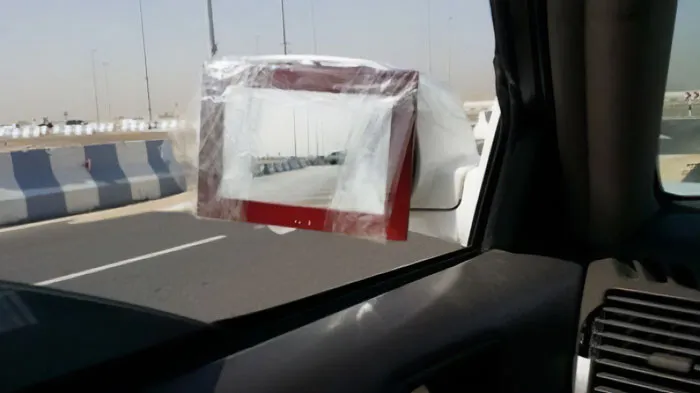 Mirror attached to a car's mirror 