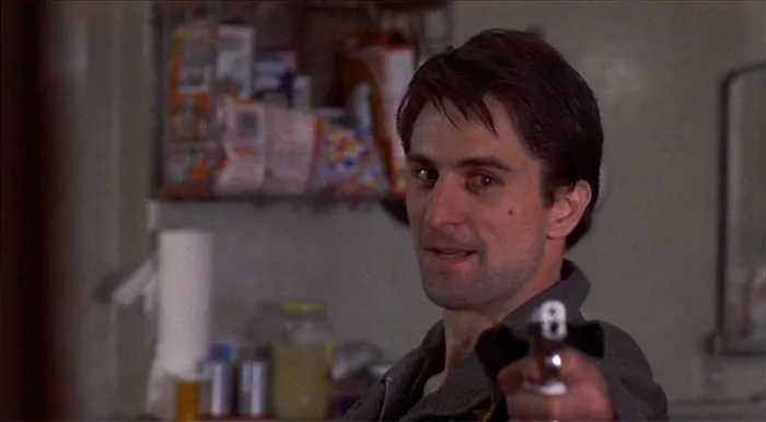 Travis Bickle with a gun