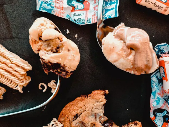 Caramel ice cream on the table spoon 