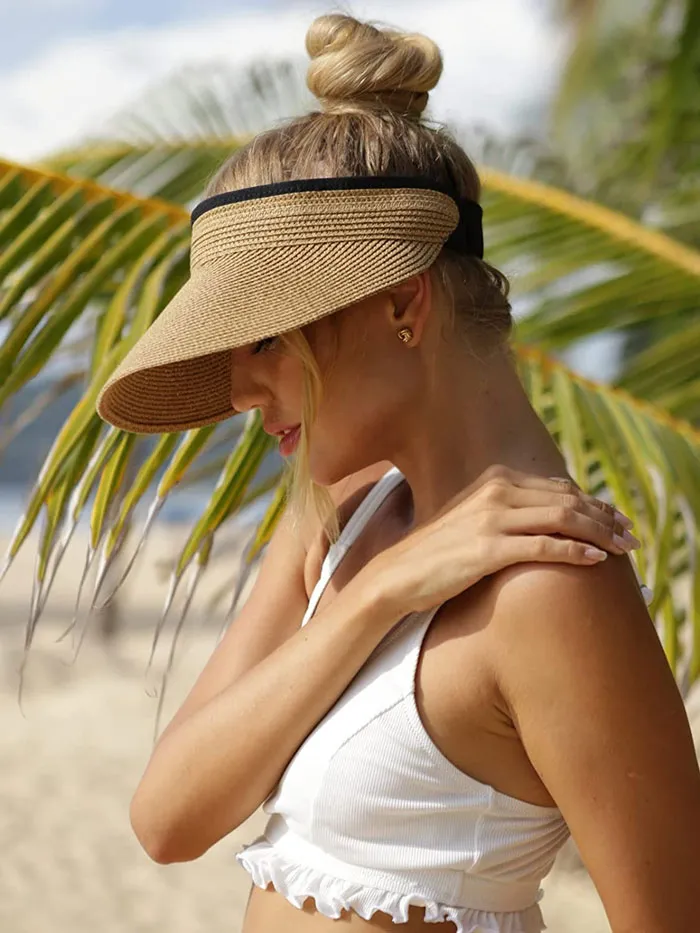 Woman wearing sun visitor