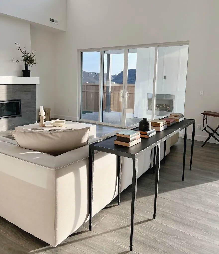 White living room with glass doors 