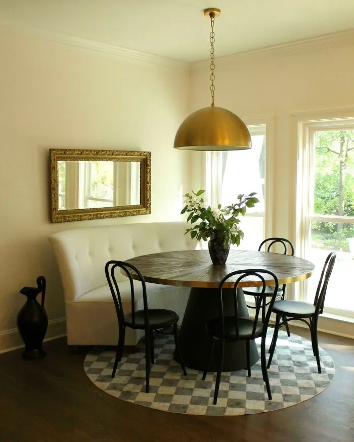 White dinning room with big windows