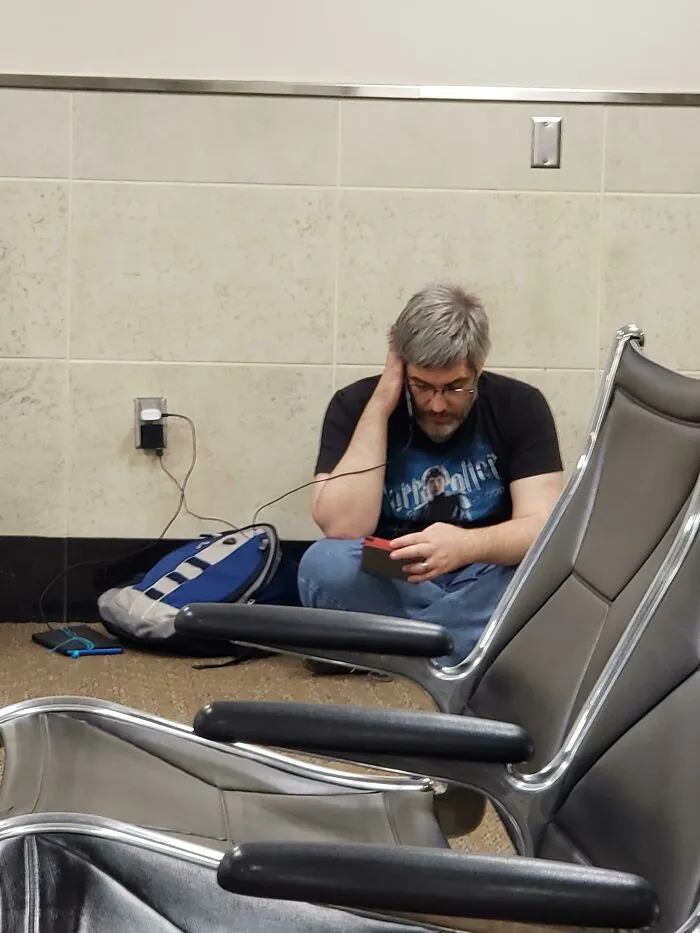 At The Airport Tonight And After Sitting Began To Hear The Soft Sound Of Reading Aloud (With Voices!)