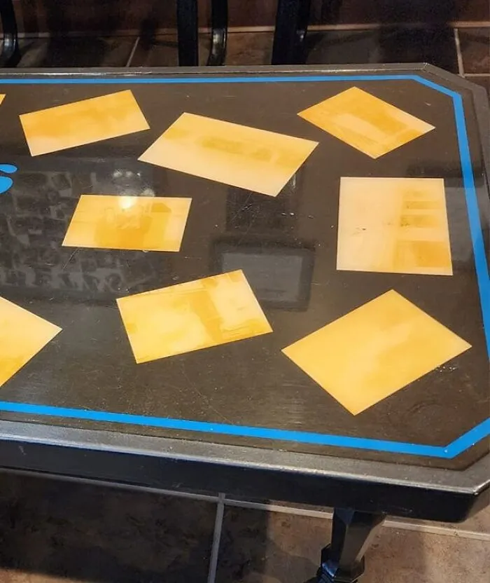 It Took Me A Minute To Realize These Are "Artsy" Photos. I Thought They Looked Like Cheese Slices On The Coffee Table