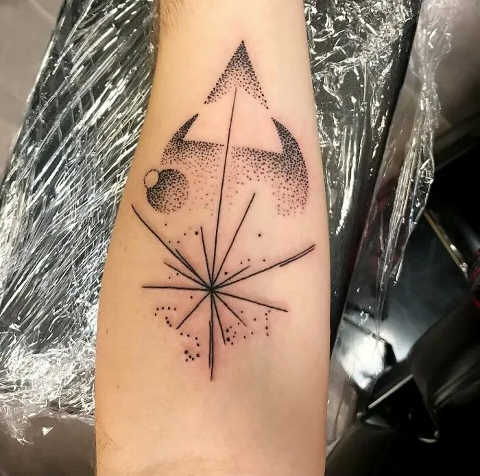 Geometric design tattoo on forearm symbolizing family bonds.