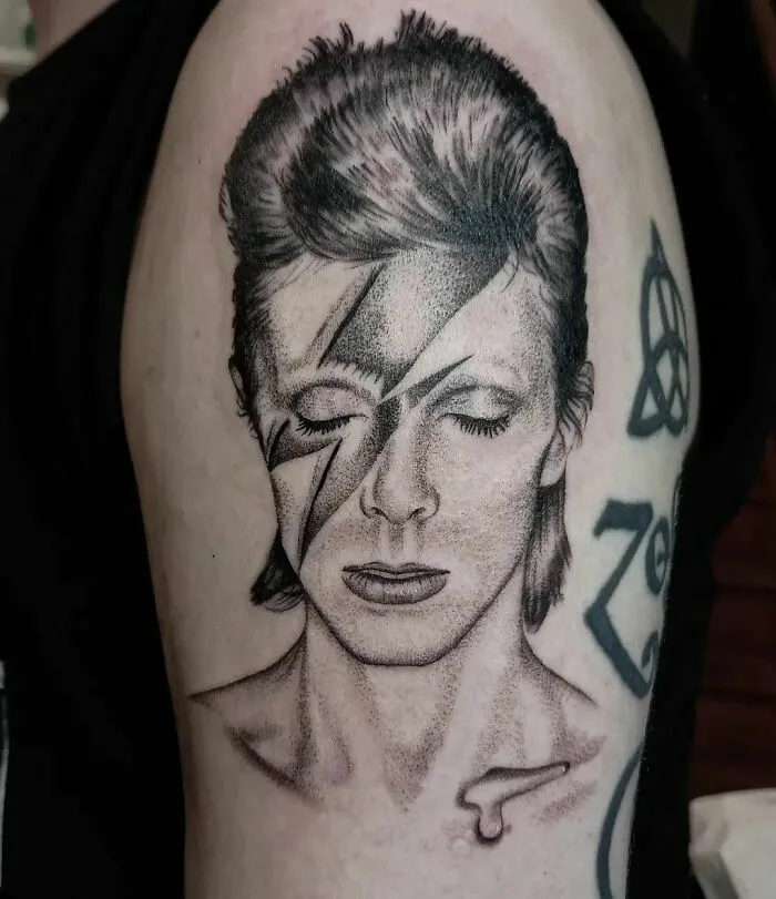 Realistic David Bowie Portrait Tattoo