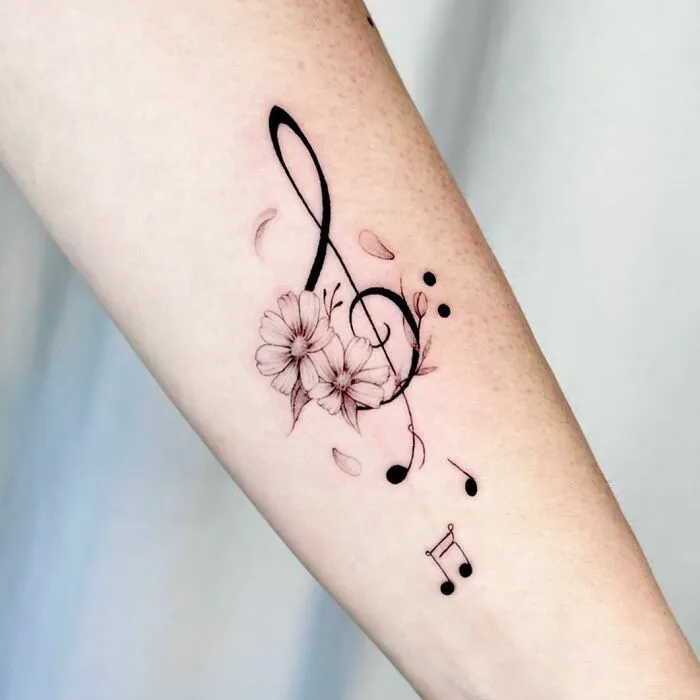 Delicate Music Tattoo