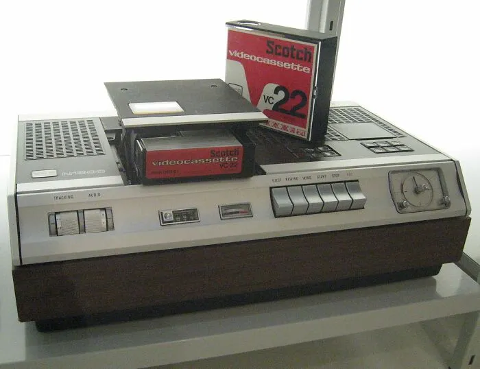 Vintage videocassette player with Scotch VC22 tape, an iconic old gadget and trendsetter of its time.