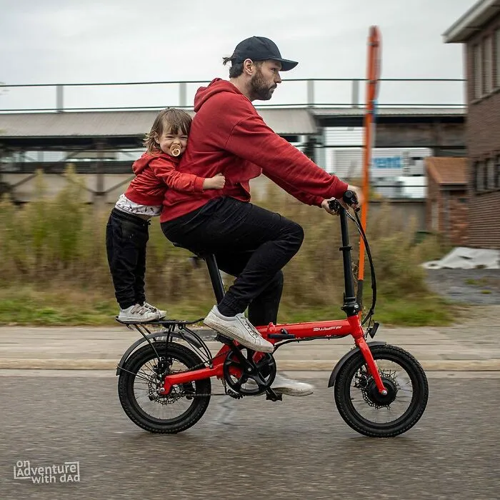 My Bike Don’t Jiggle Jiggle, It Folds.  Dad Forgot To Bring The Kiddy Bike, So We Had To Get Creative. Luckily Alix’ Balance Is On Point. Even When Dad Is Going Fast, Trying To Make Up On Some Lost Time
