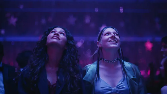 Two girls looking up