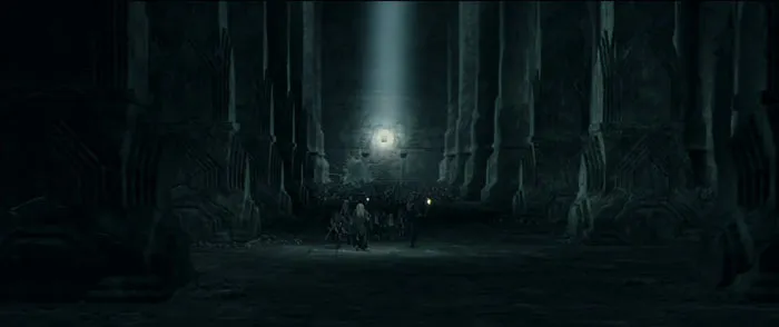 the fellowship surrounded by goblins in a dark cave