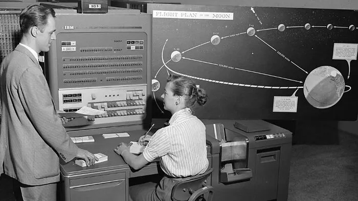 Woman Sitting In Front Of The Computer