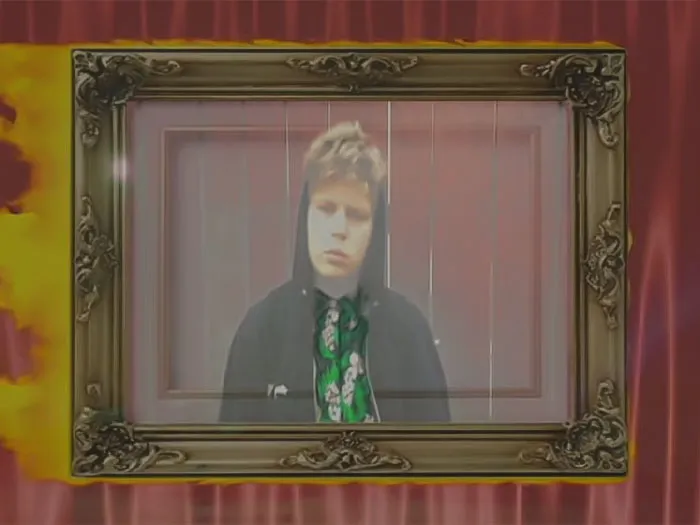 Image from Yung Lean - Oreomilkshake music video - a boy with a black hoodie in a decorative frame