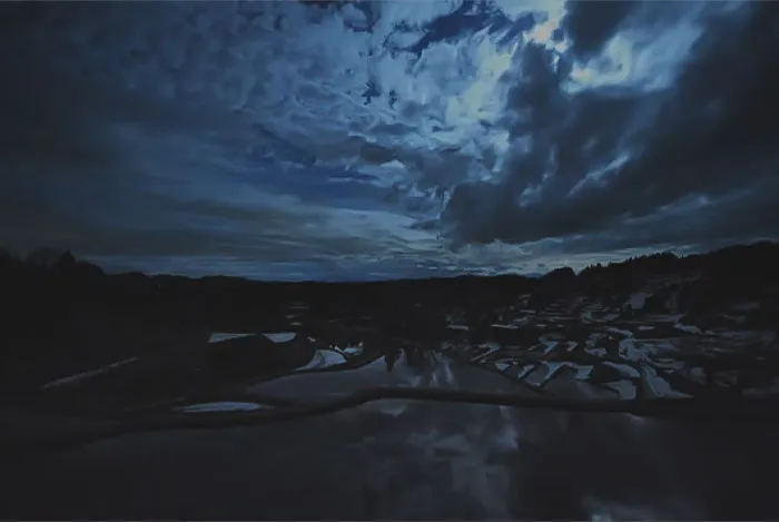 Image from Ducktails - Deck Observatory music video - water and clouds in dark atmosphere