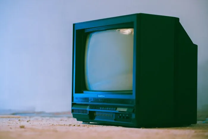 Old chunky TV screen, a classic vintage gadget symbolizing the trendsetters of their time in technology history.