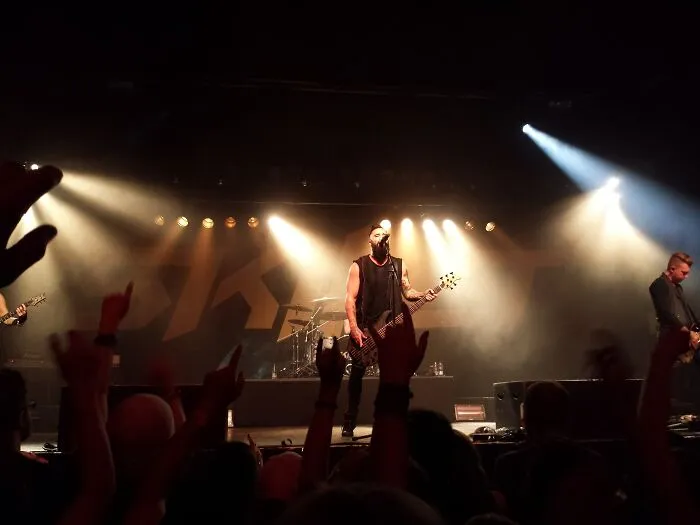 Man playing a guitar on the stage 