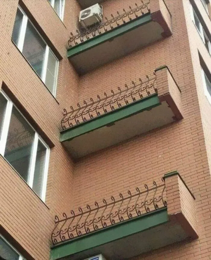 Safety First! No-One Falls Off Our Balconies! Although We Have Lost A Few Tenants Who Were Trying To Get From Their Windows To The Balconies. Building Codes And Architectural Plans Are For Sissies!!!