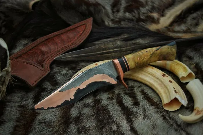 Soy un joven herrero sudafricano y he fabricado este cuchillo al que he llamado "Puesta de sol  Africana"