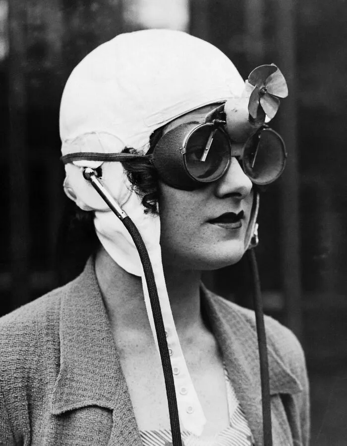 Rain Goggles For Racing Car Driver. In An Open Car, The Fan Would Start Moving At About 15 Miles Per Hour, Putting The Tiny Wipers In Motion And Clearing The Water From The Lenses. England, 1930s
