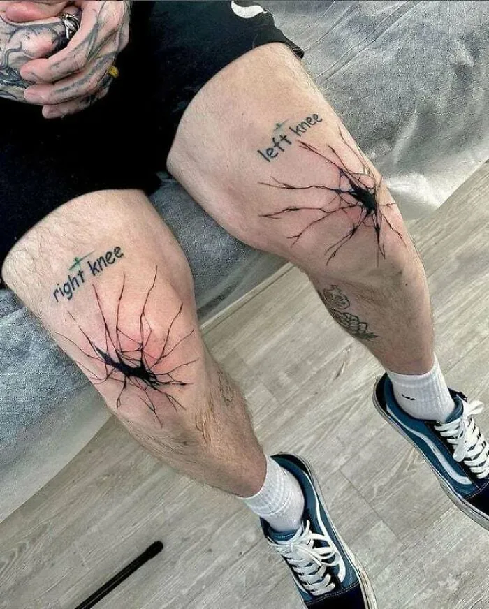 Cracked pattern knee tattoos labeled "left knee" and "right knee" on a person sitting, showcasing unique tattoo design.