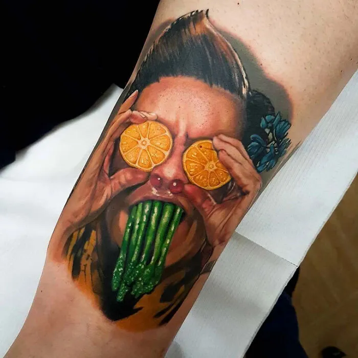 Ace Ventura Arm Tattoo