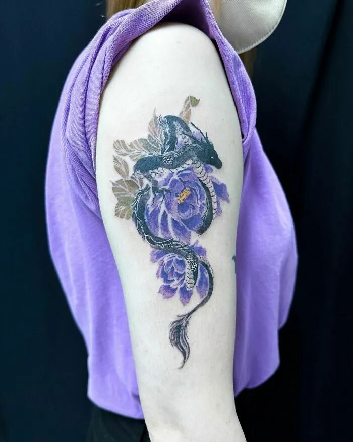 Dragon Tattoo With Lavender Colored Flowers 