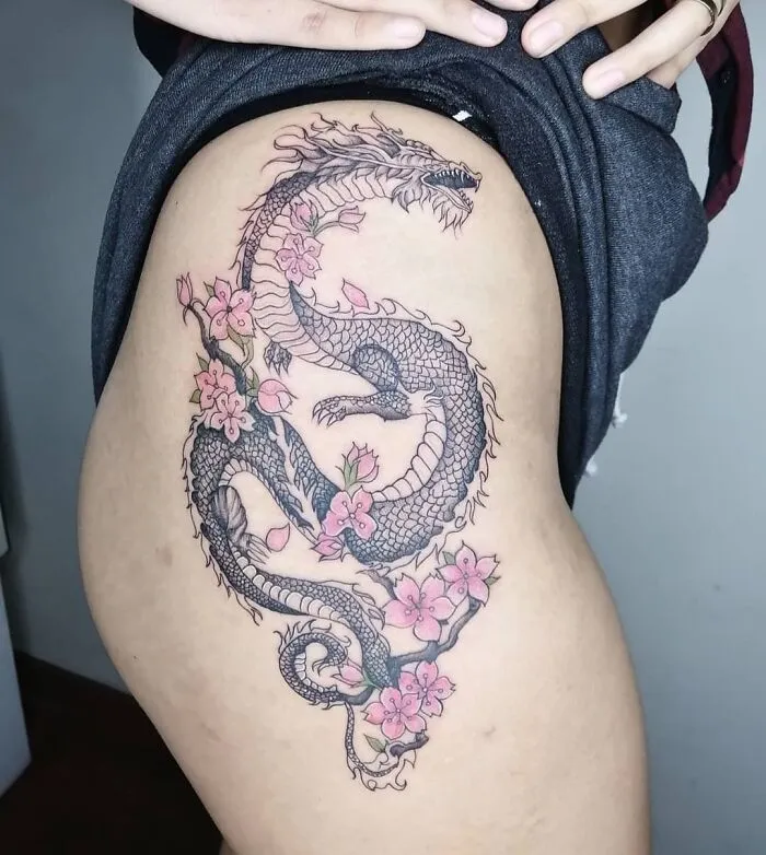 Black Ink Dragon With Cherry Blossoms Tattoo