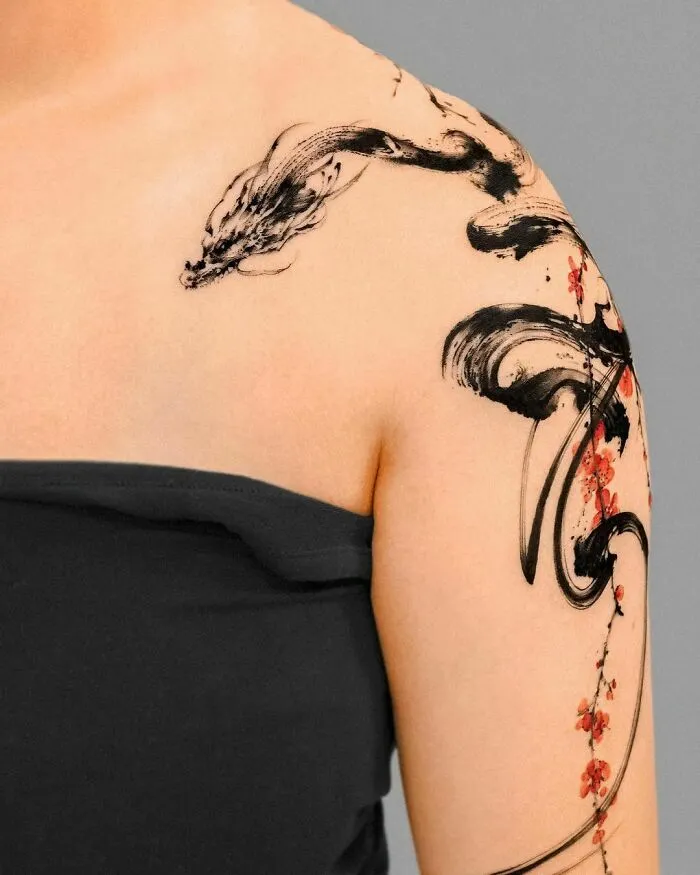 Black Ink Dragon On Shoulder Brushstroke Style Tattoo