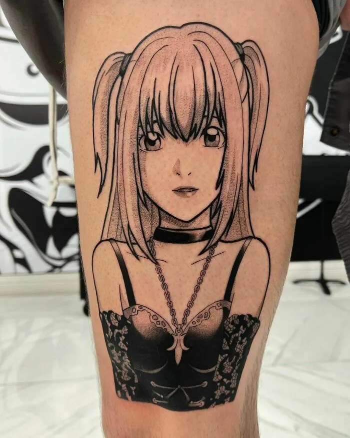 Anime tattoo featuring a detailed character with pigtails and a choker on a leg.