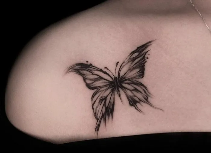 Butterfly collarbone tattoo design for men and women.