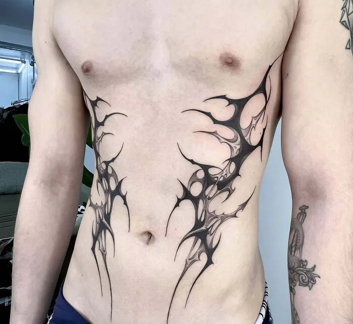 Cyber Tribal Torso Tattoo