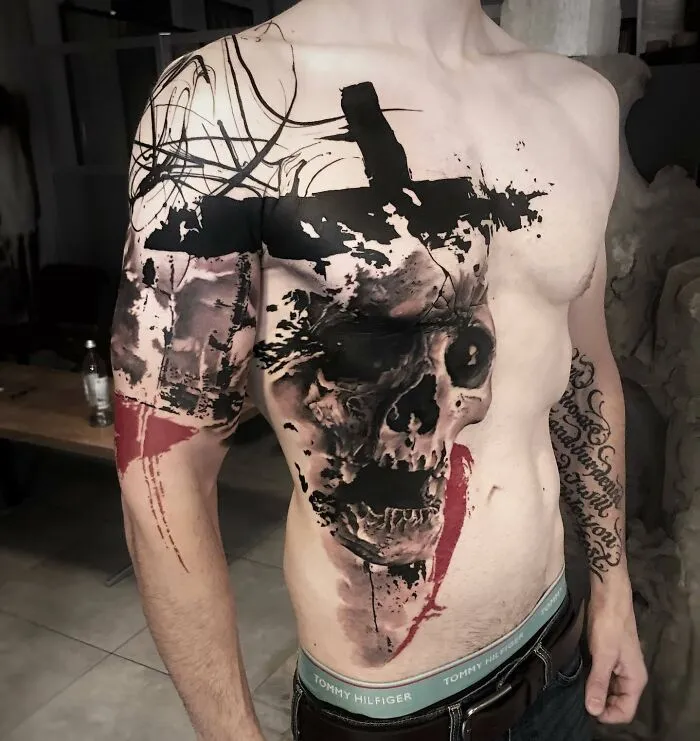 Large Trash Polka Tattoo With Skull And Cross