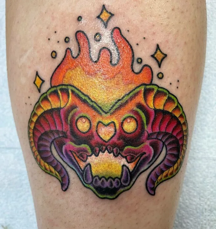 Colorful Balrog tattoo design from Lord of the Rings with flames and vibrant hues.