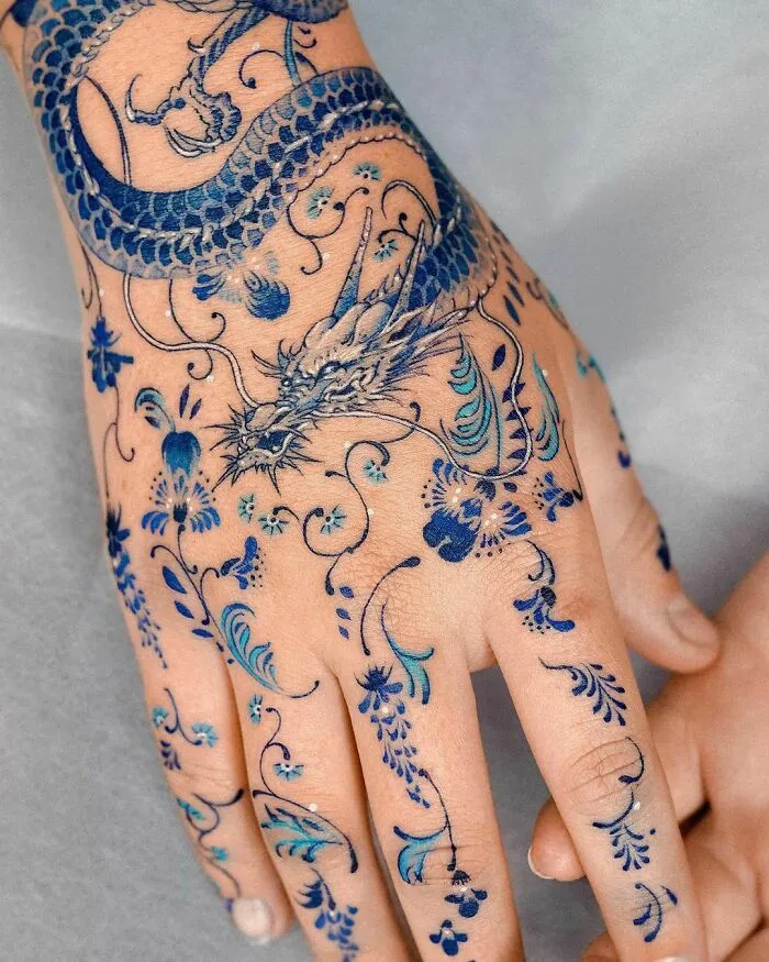 Porcelain Hand With Dragon And Flower Pattern Tattoo