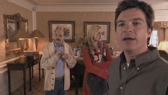 Michael Maeby and Tobias looking from Arrested Development  pilot