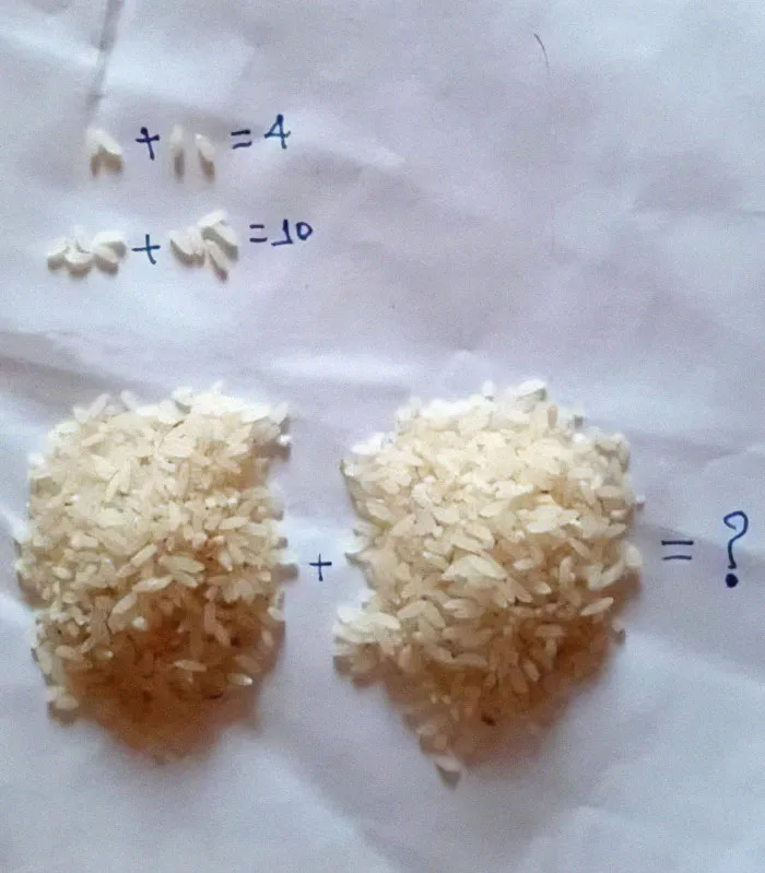 Math meme with rice piles representing an equation, humorously challenging basic math understanding.