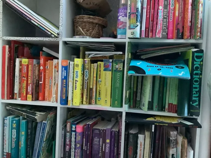 My Bookshelf! It’s A Bit Messy Right Now Lol But I Have Them Organized By Color And Then My Record Collection In One Corner (Cause It’s Next To My Record Player) And My Makeup Counter Is On Top Of The Shelf