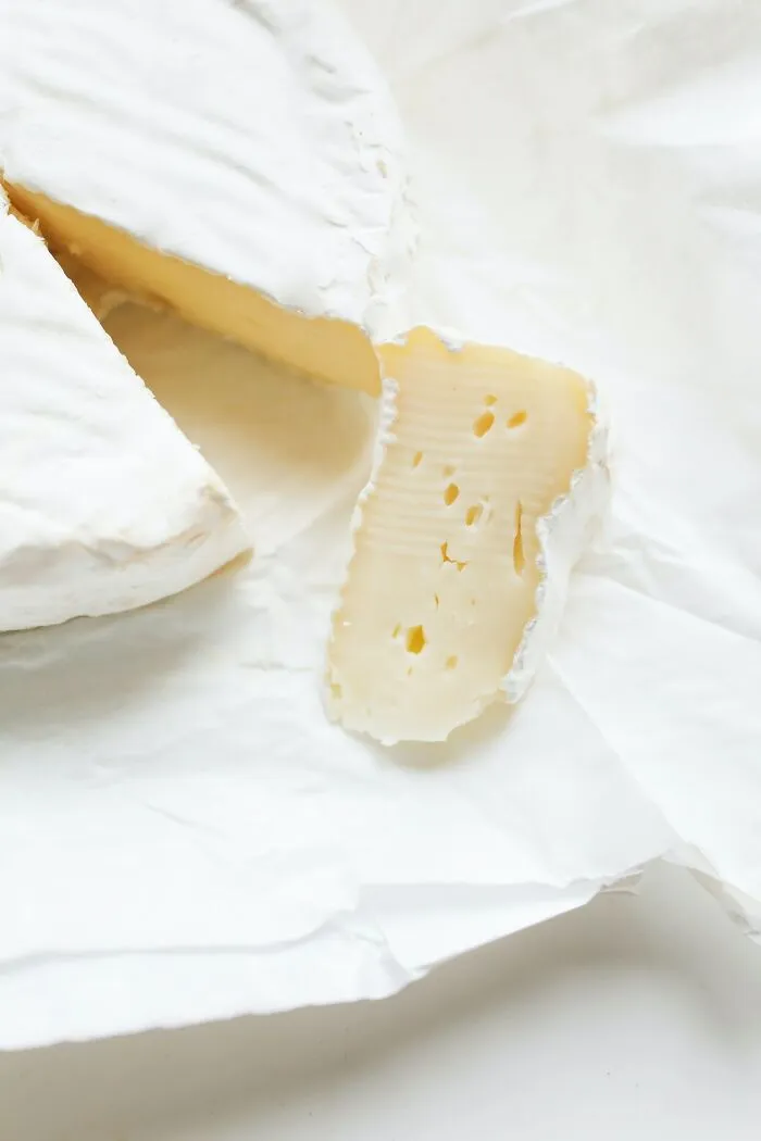 Freshly Cut Piece On Cheese 