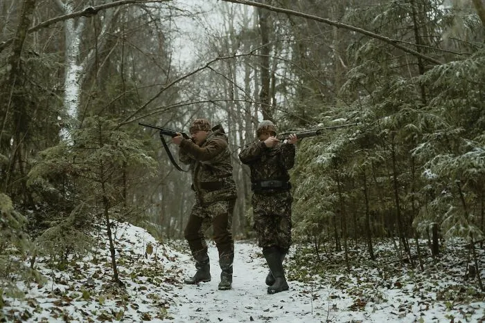 Two People Going On A Hunt