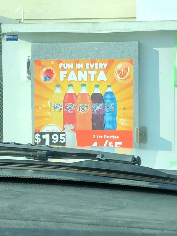 The Way That All The Other Fanta Bottles Are Filled Evenly And Then The Blue Bottle