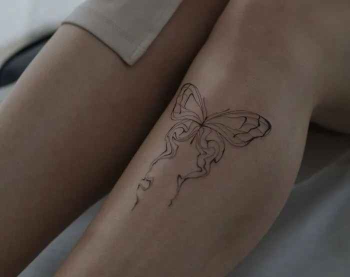 Cute Butterfly On The Leg Tattoo