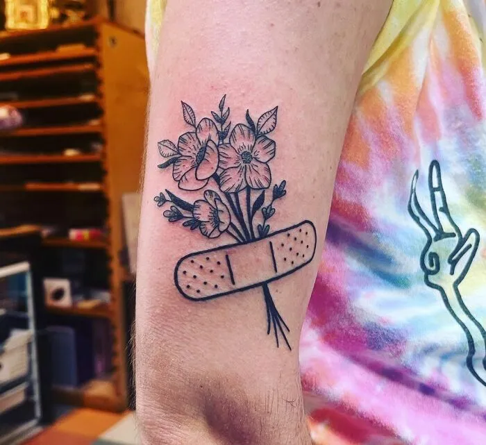 'We Grow From Our Wounds' Tattoo