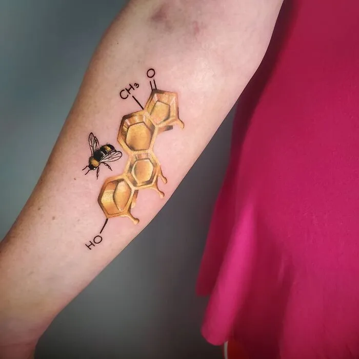 Golden Honey Comb Bee Tattoo On Arm