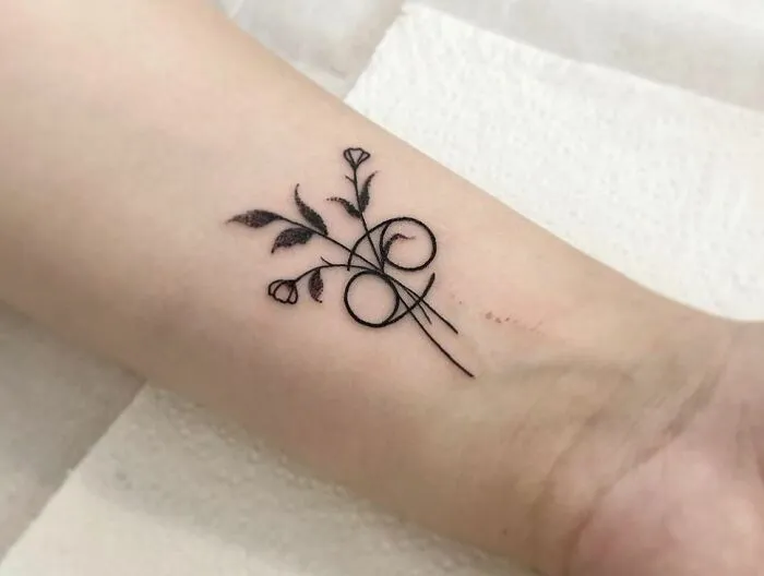 Small Floral Cancer Arm Tattoo