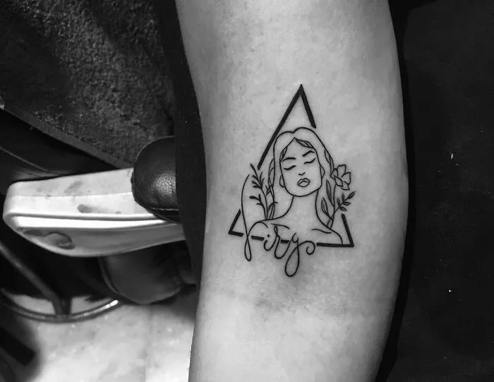 Graphic Virgo Arm Tattoo