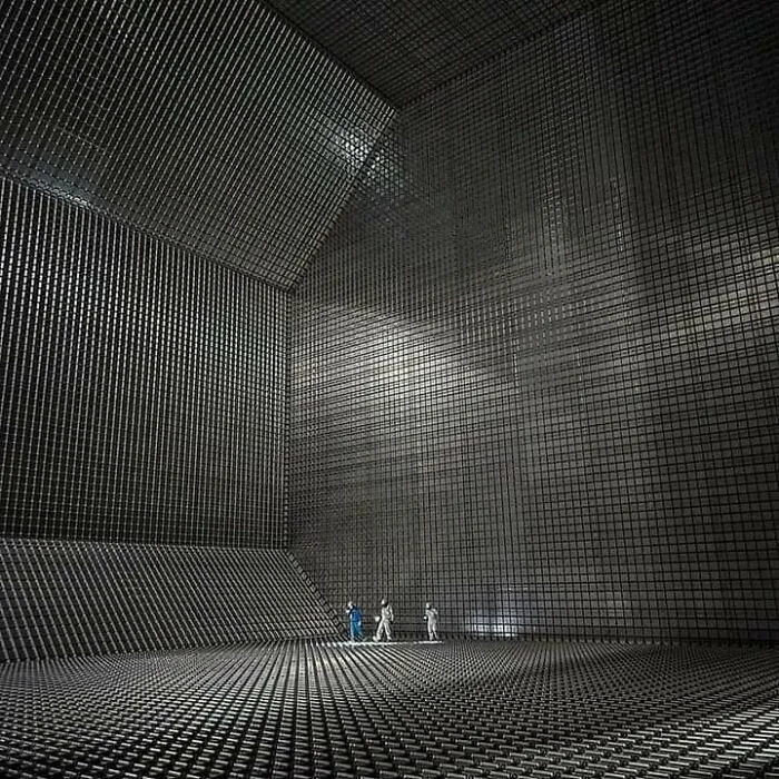 Crew Members Standing Inside The Cargo Tank Of An Lng (Liquefied Natural Gas) Tanker 