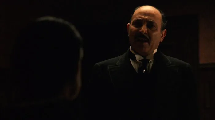 Amerigo Bonasera speaking with don vito corleone