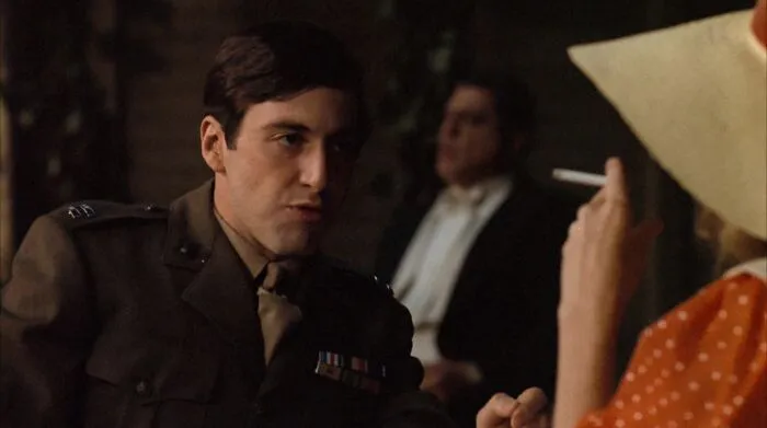 Michael Corleone looking forward and talking 