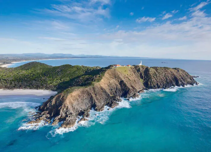 An Aerial Photograph Of Byron Bay's Iconic Lighthouse